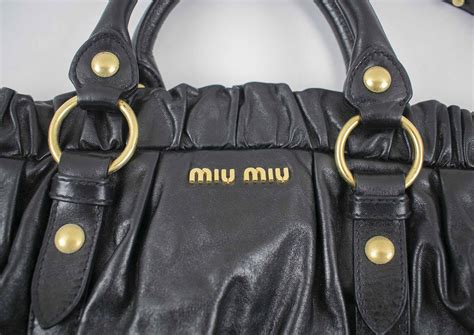 miu miu serial number 197|how to identify miu miou bags.